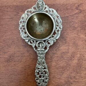 Elegant Silver Tea Strainer/Spoon with Ornate Design